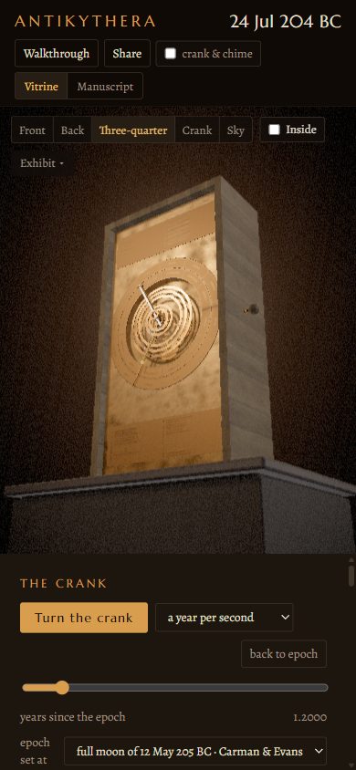 The exhibit on a phone: the case on its plinth, the crank controls below